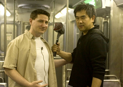 sur le tournage (le réalisateur à droite)